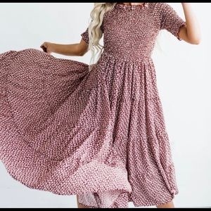 Dark red smocked tiered floral midi dress